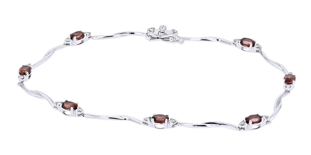 10K WG Garnet Bracelet