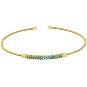 Gold Finish Sterling Silver Cable Cuff Bracelet with Three Rows of Simulated Blue Zircon Birth Gems - December