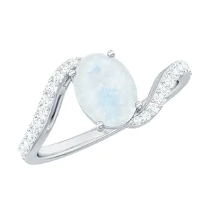 Oval Cut Solitaire Moonstone and Diamond Bypass Ring