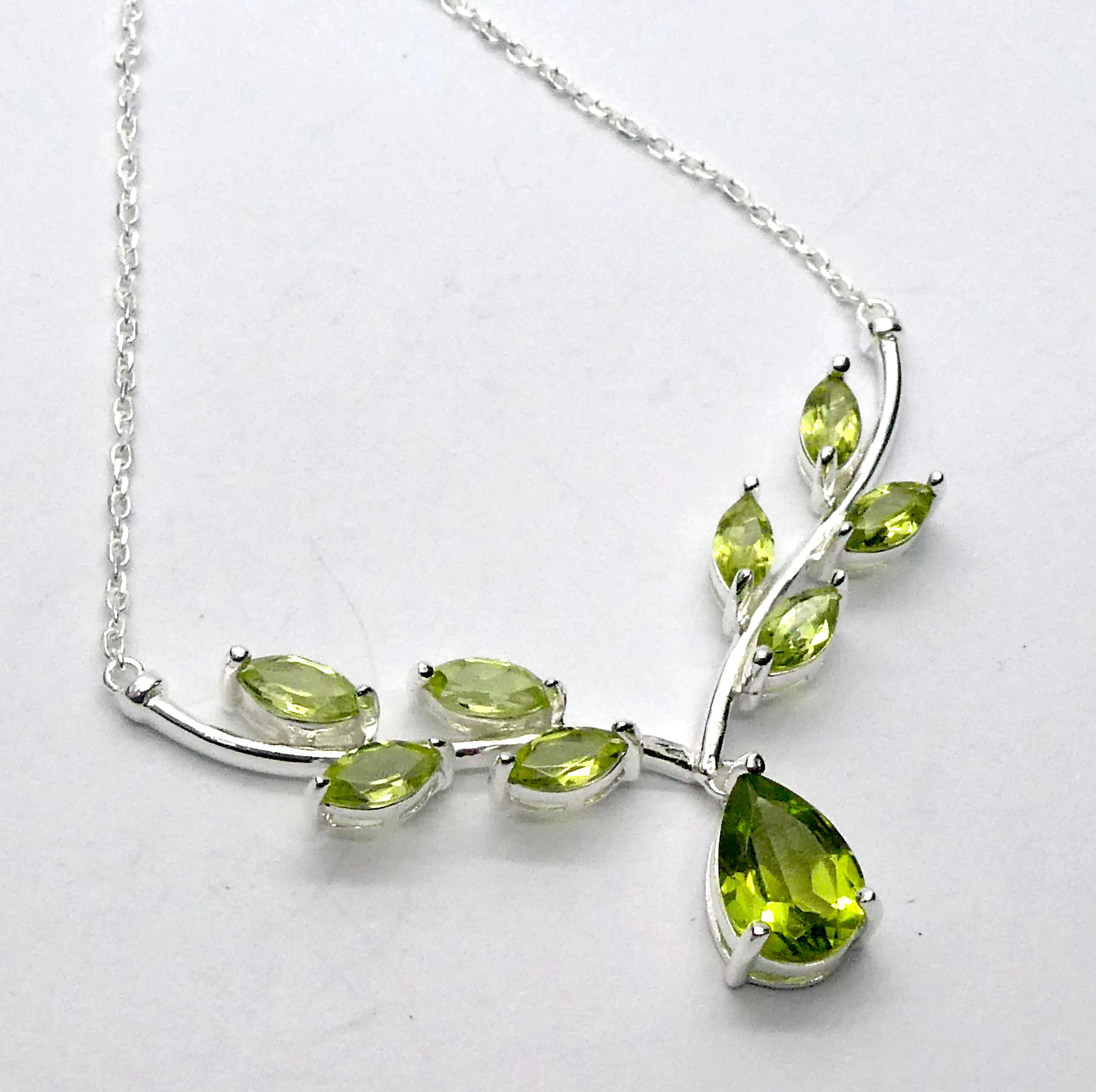 Peridot Necklace, 9 faceted stones, Nature Themed, 925 Sterling Silver