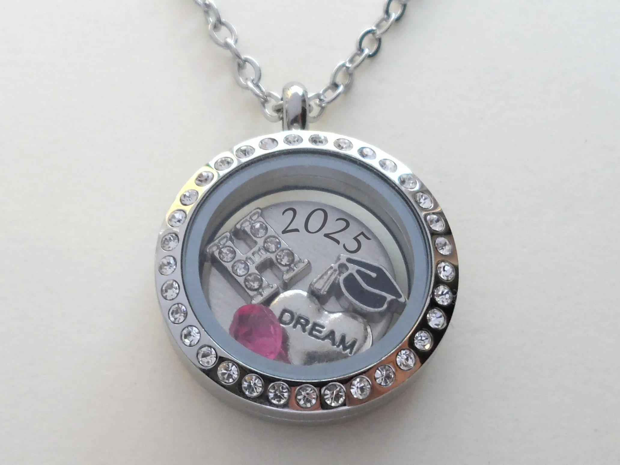 Personalized 25mm Circle Class of 2025 Graduate Floating Locket Necklace with Clear Crystal Edge for Graduation with Letter & Birthstone Charm - by Jewelry Everyday